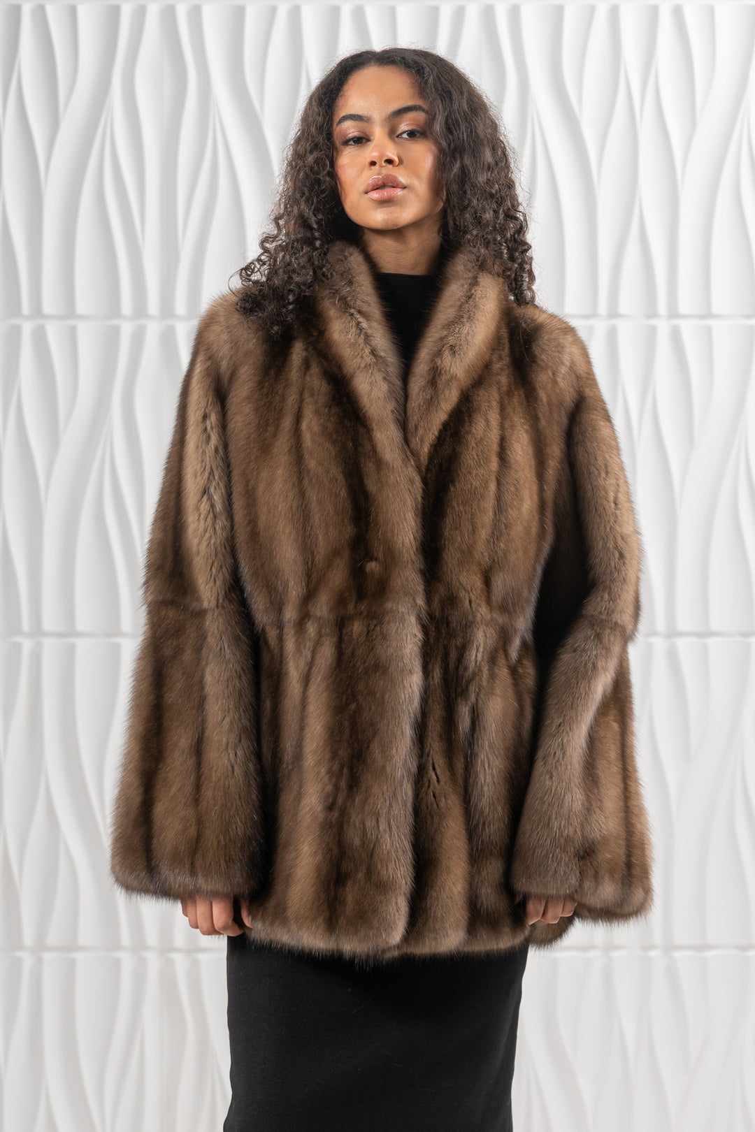 Luxurious Platinum Russian sable fur coat on display