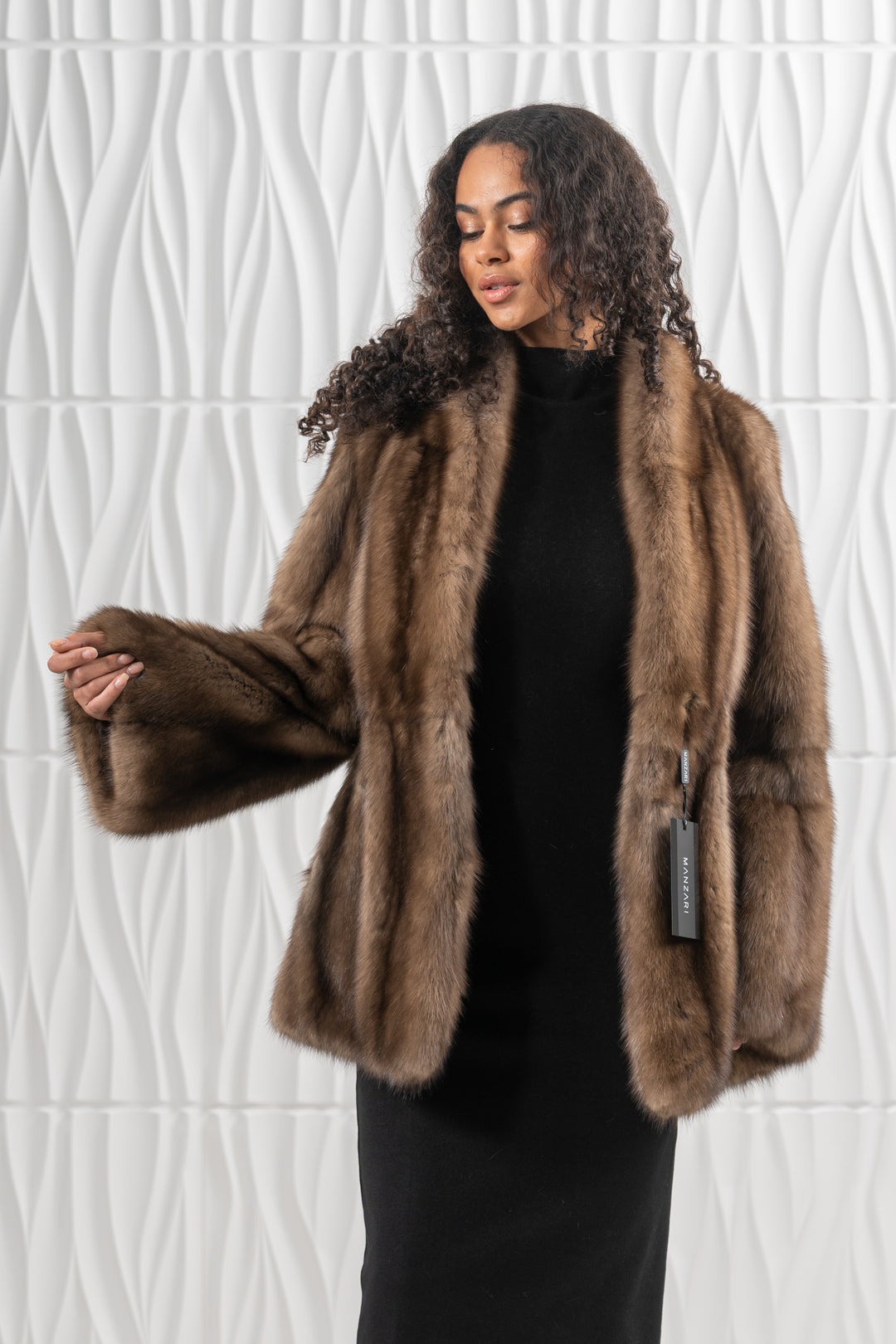 Luxurious Platinum Russian sable fur coat on display