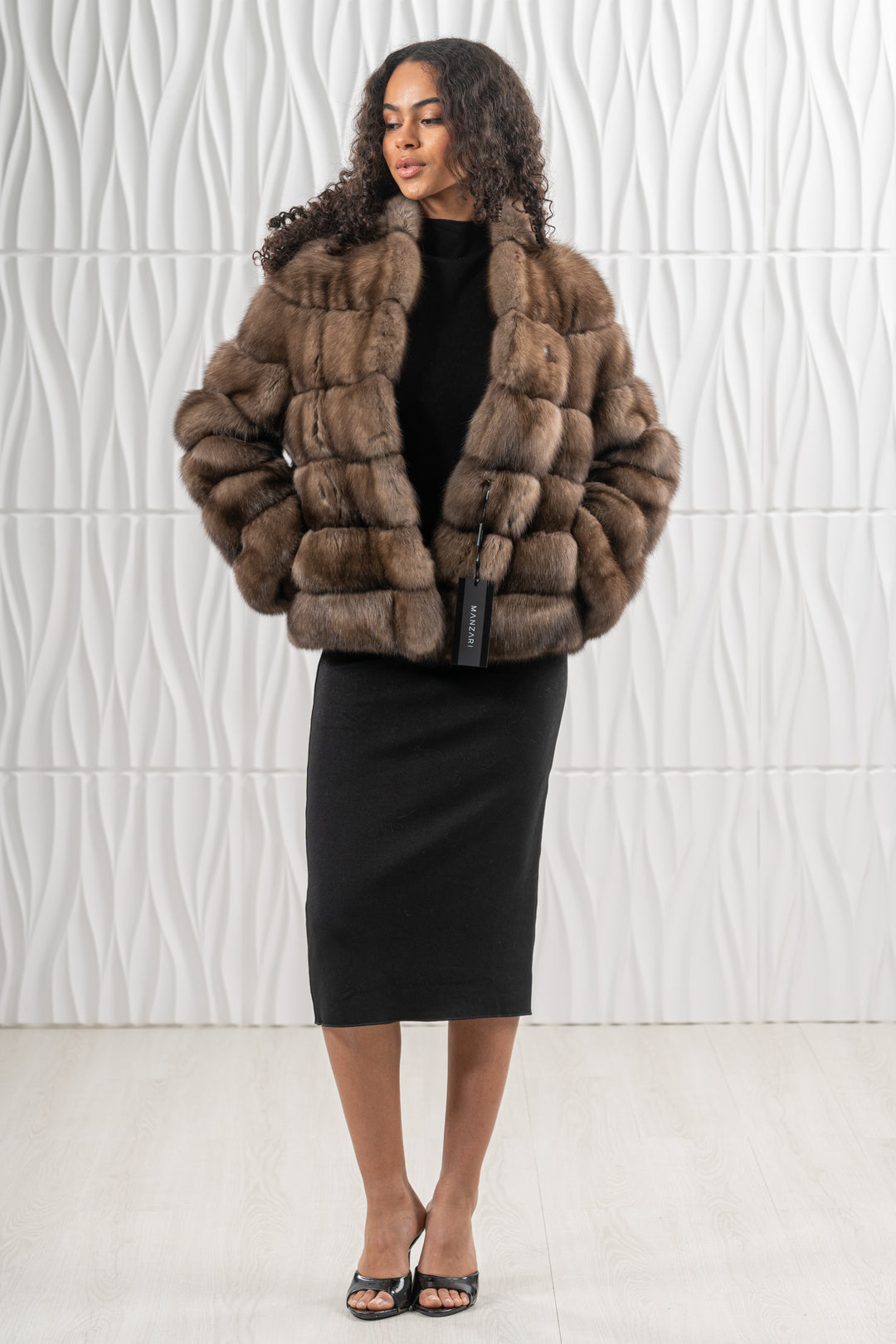 Luxurious Platinum Russian sable fur coat on display