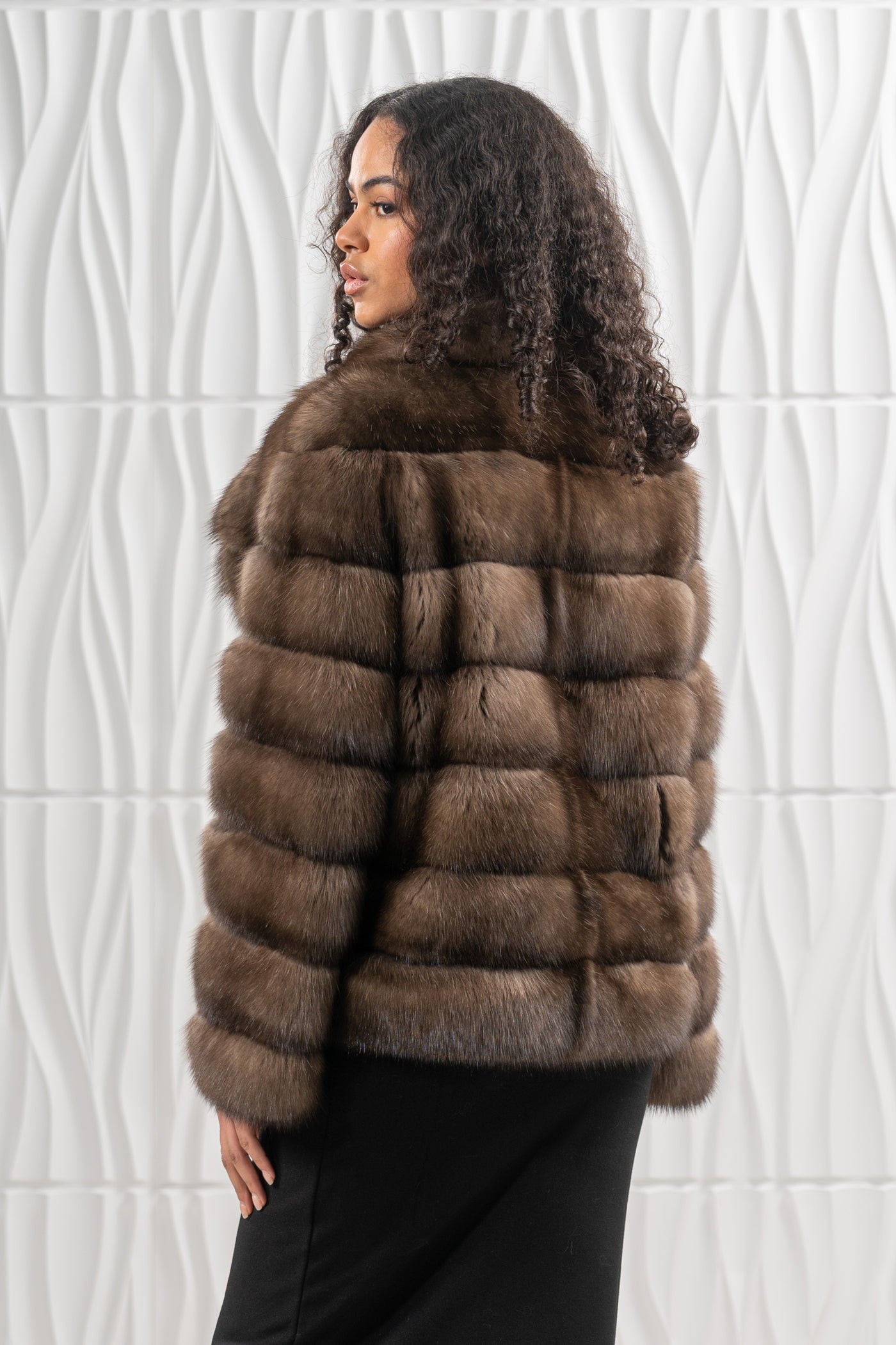 Model wearing a manzari russian sable fur coat by manzari