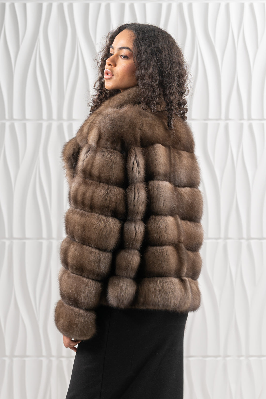 Model wearing a Platinum Russian sable fur coat by manzari