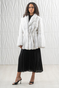 Model wearing a Snow White Chinchilla fur coat by manzari