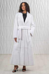 Model wearing a White Mink fur coat