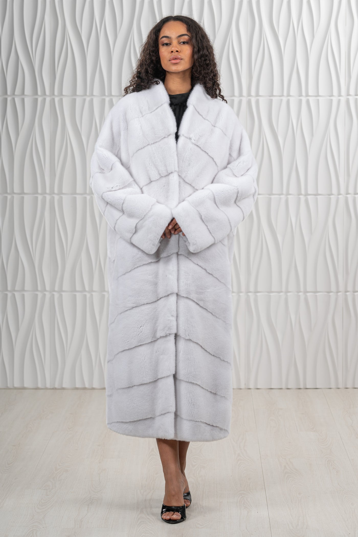 Model wearing a manzari mink fur coat