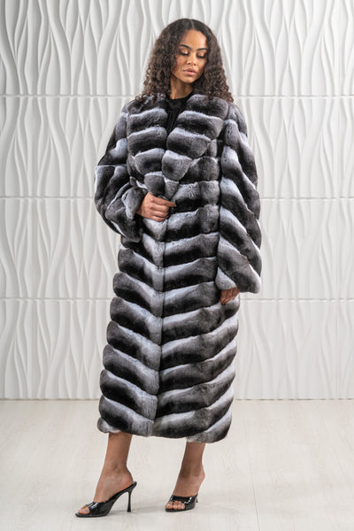 Model wearing a manzari chinchilla fur coat by manzari