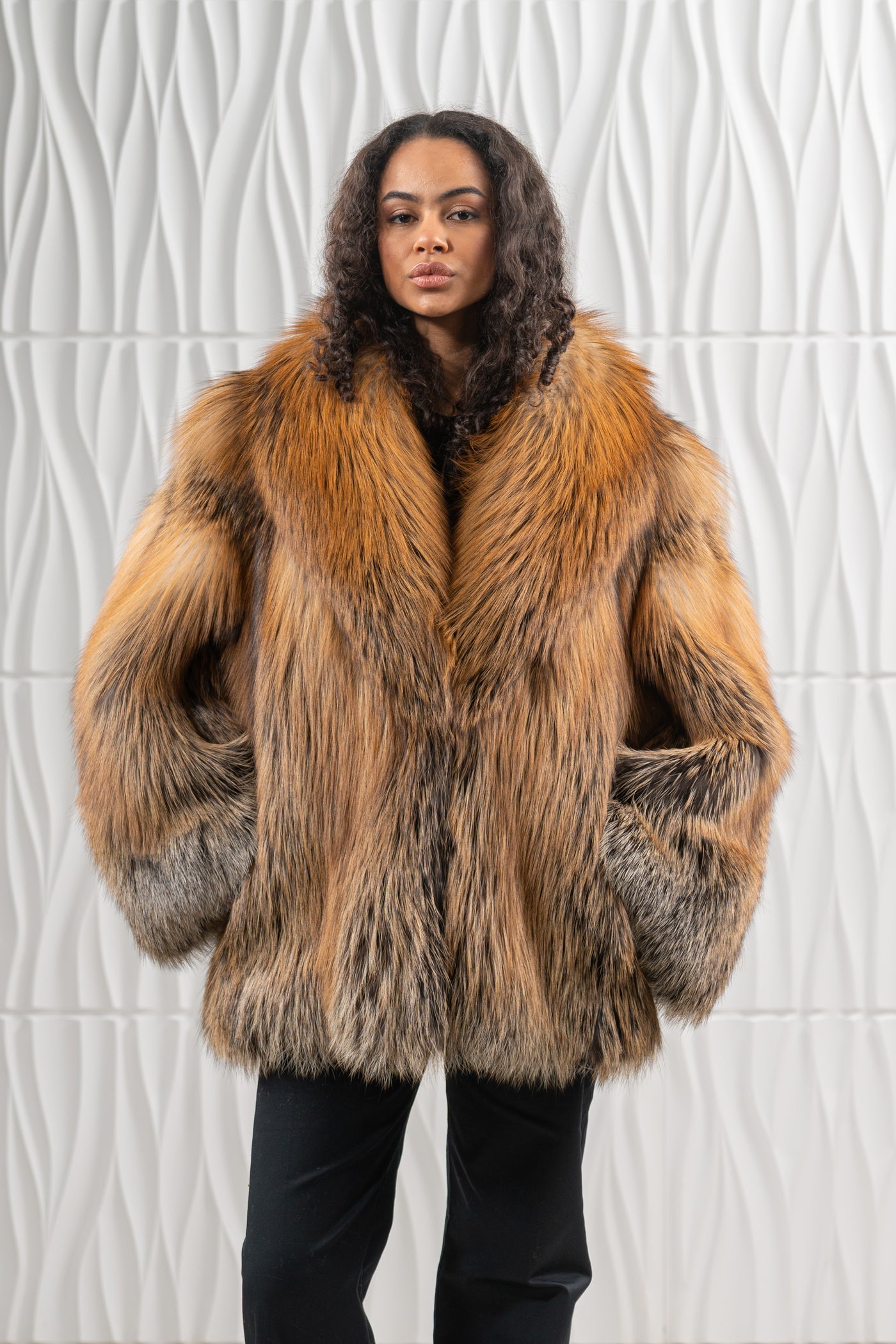 Model wearing a manzari fox fur coat by manzari
