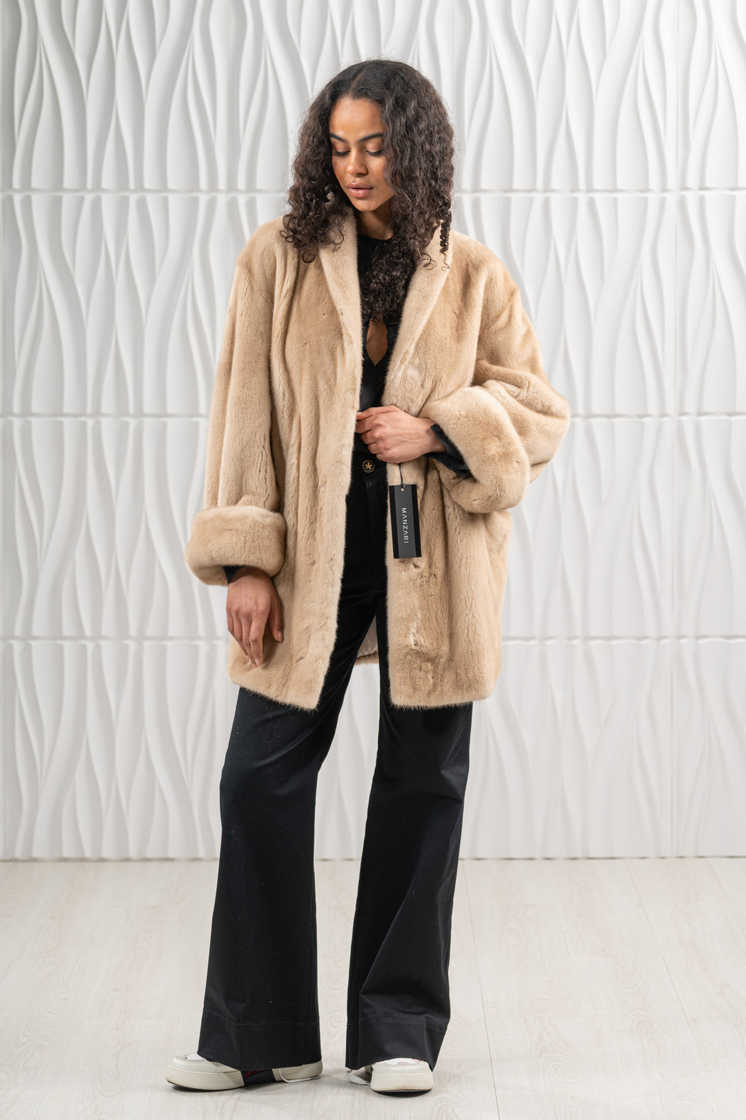 Model wearing a Palomino Mink fur coat