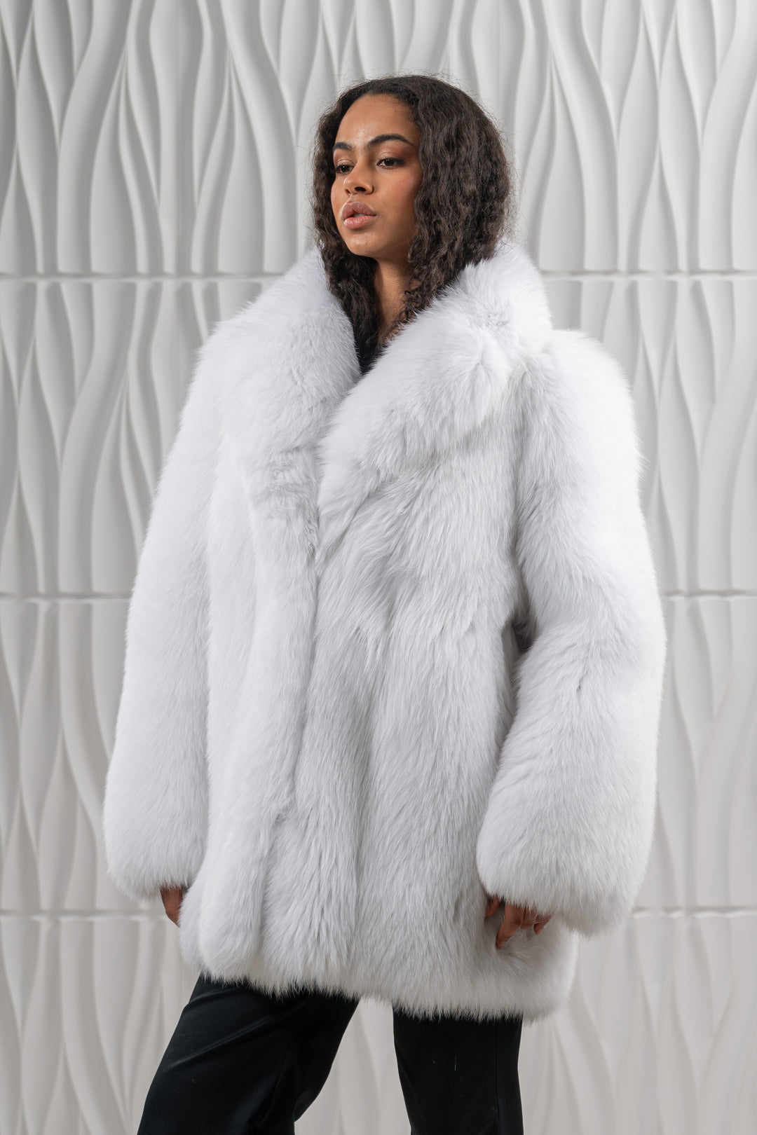 Model wearing a Shadow Blue Frost Fox fur coat by manzari