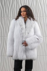 Arctic Marble fox fur short jacket with a wide lapel collar and dense, long-haired white and grey texture.