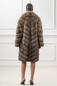 Model wearing a Platinum Russian sable fur coat by manzari