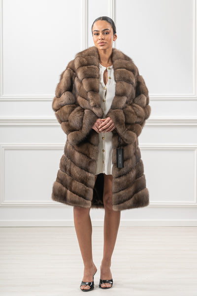Model wearing a manzari russian sable fur coat by manzari
