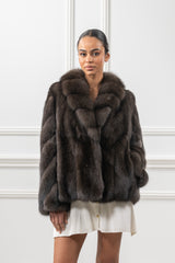 Short Russian sable jacket with a plush collar, featuring a V-chevron pattern on the sleeves and a straight hem.