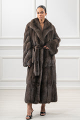 Russian sable coat in a rich brown, featuring a waist-defining matching fur tie belt, long sleeves, and a soft wide collar.