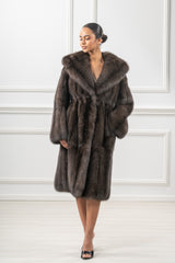 Carbonio silvery Russian sable jacket with a large hood, long sleeves, and a vertical pelt construction, shown from the front.