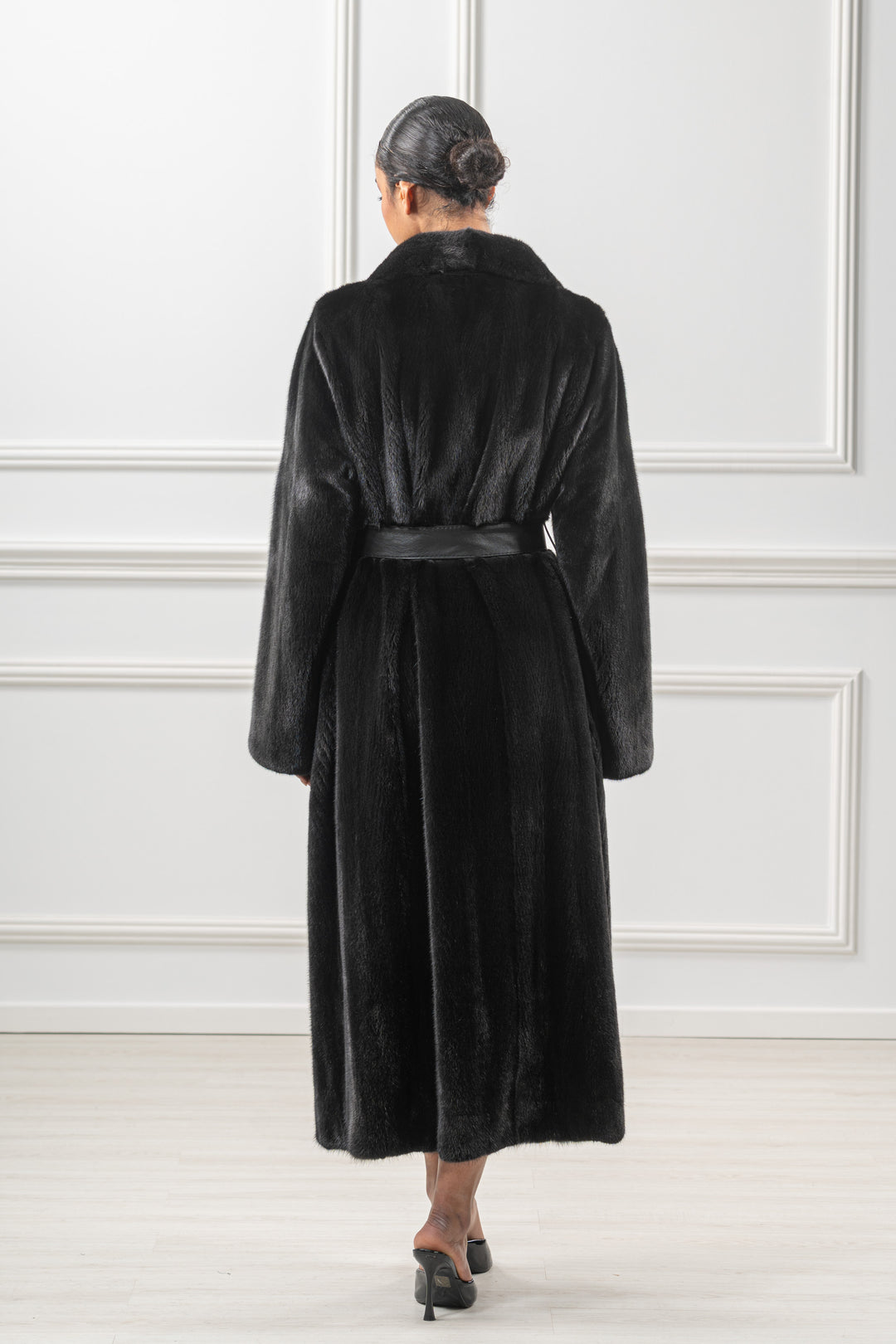 Model wearing a Black Mink fur coat