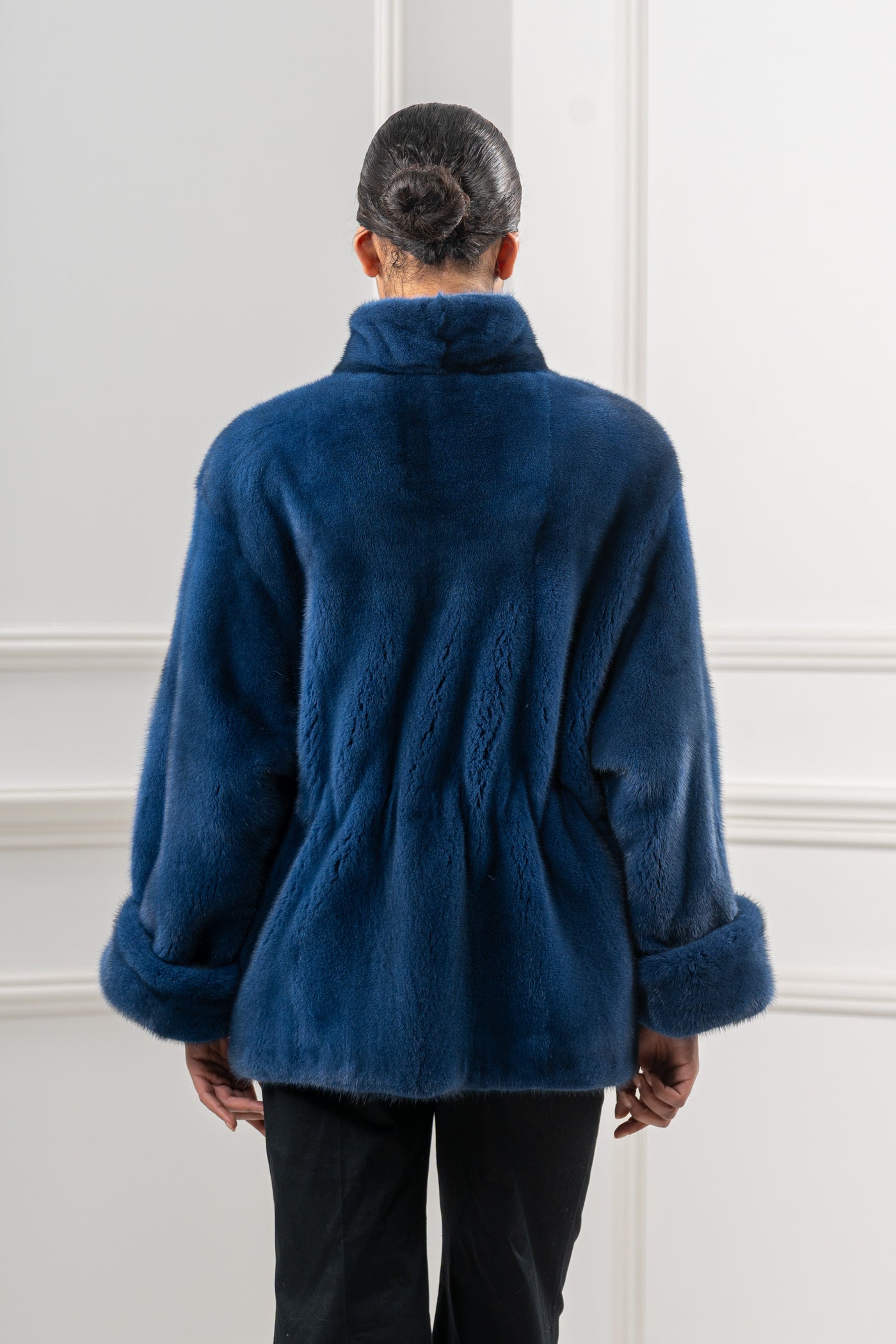 Model wearing a manzari mink fur coat