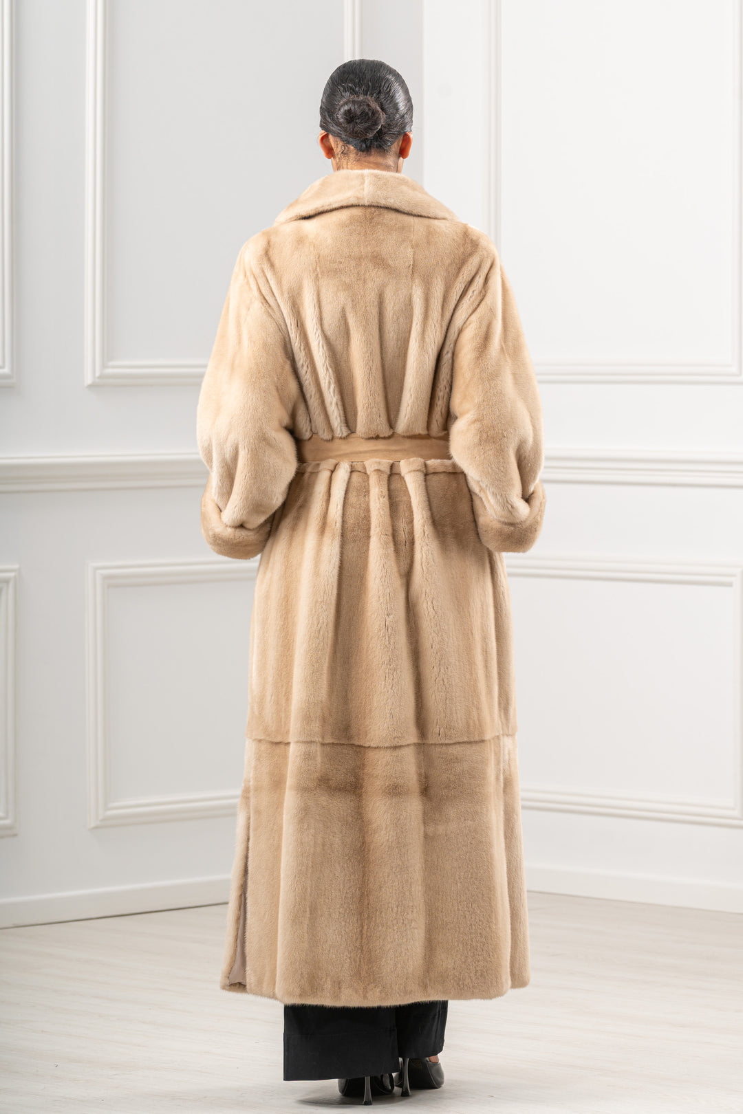 Model wearing a Palomino Mink fur coat