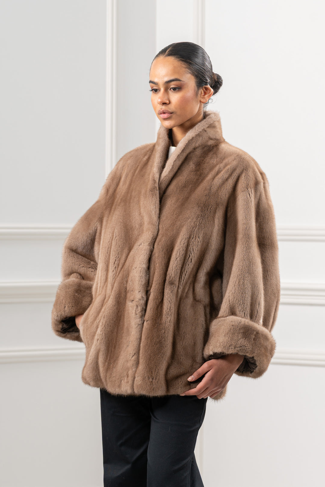 Model wearing a Pastel Mink fur coat