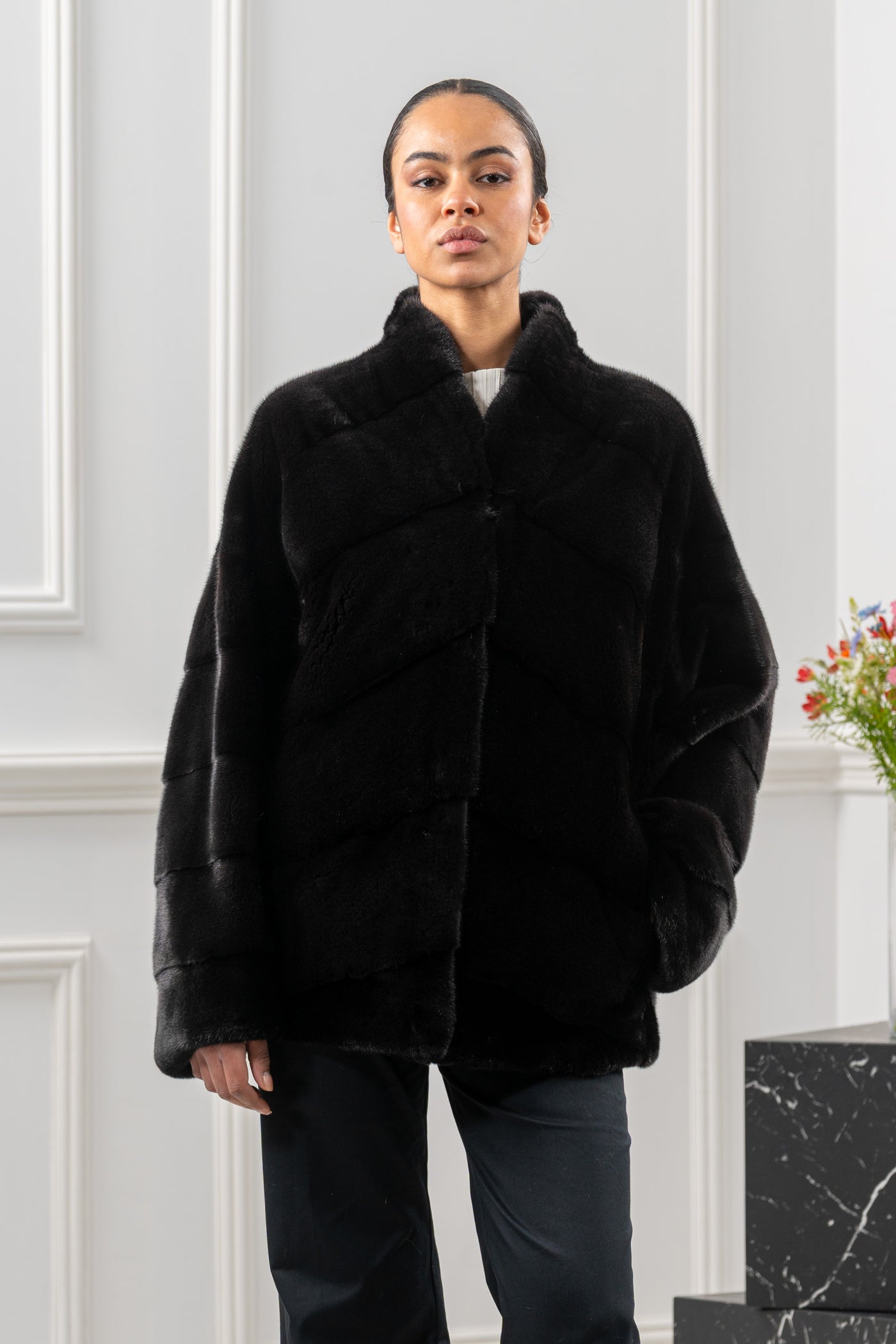 Model wearing a manzari mink fur coat