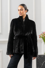 Black mink short jacket featuring a stand-up collar, wide sleeves, and a matching self-tie fur belt cinched at the waist.