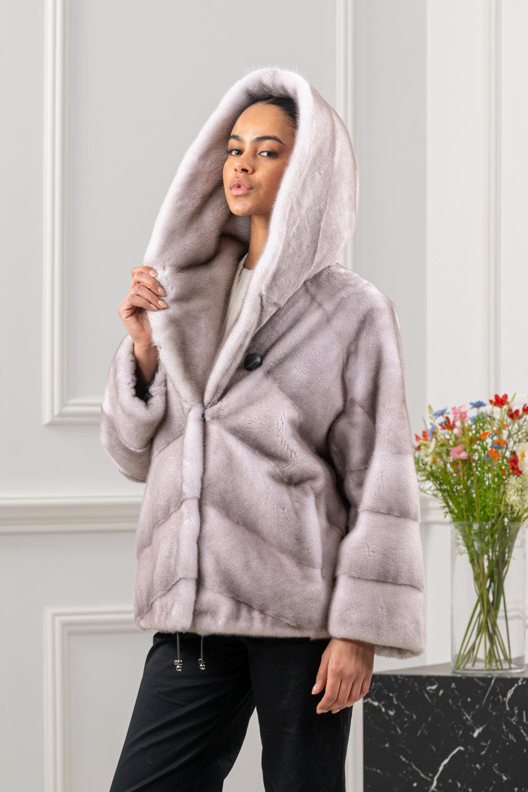 Model wearing a manzari mink fur coat