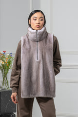 Silver blue mink fur vest with a stand-up collar, half-zip front closure, and a straight, hip-length hemline.