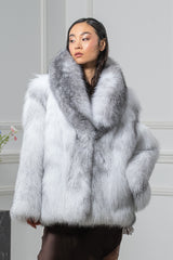 Short Arctic Marble fox fur jacket with a large shawl collar, featuring a white base with dark grey tipped guard hairs and a thick, plush texture.