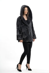 Grey metal Swakara short jacket featuring a hood and a patchwork of angular, pieced fur panels in a dark, metallic grey tone.