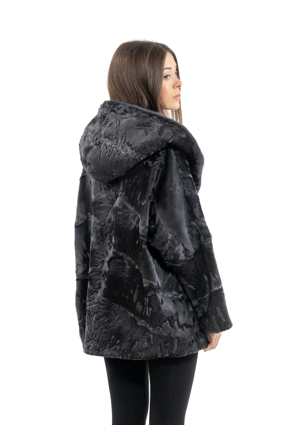 Model wearing a Grey Metal Swakara fur coat by manzari