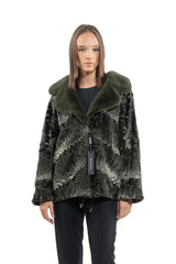 Dark olive Swakara jacket with a V chevron pattern. It has a plush dark green collar and a straight fit with a tag hanging from the front.