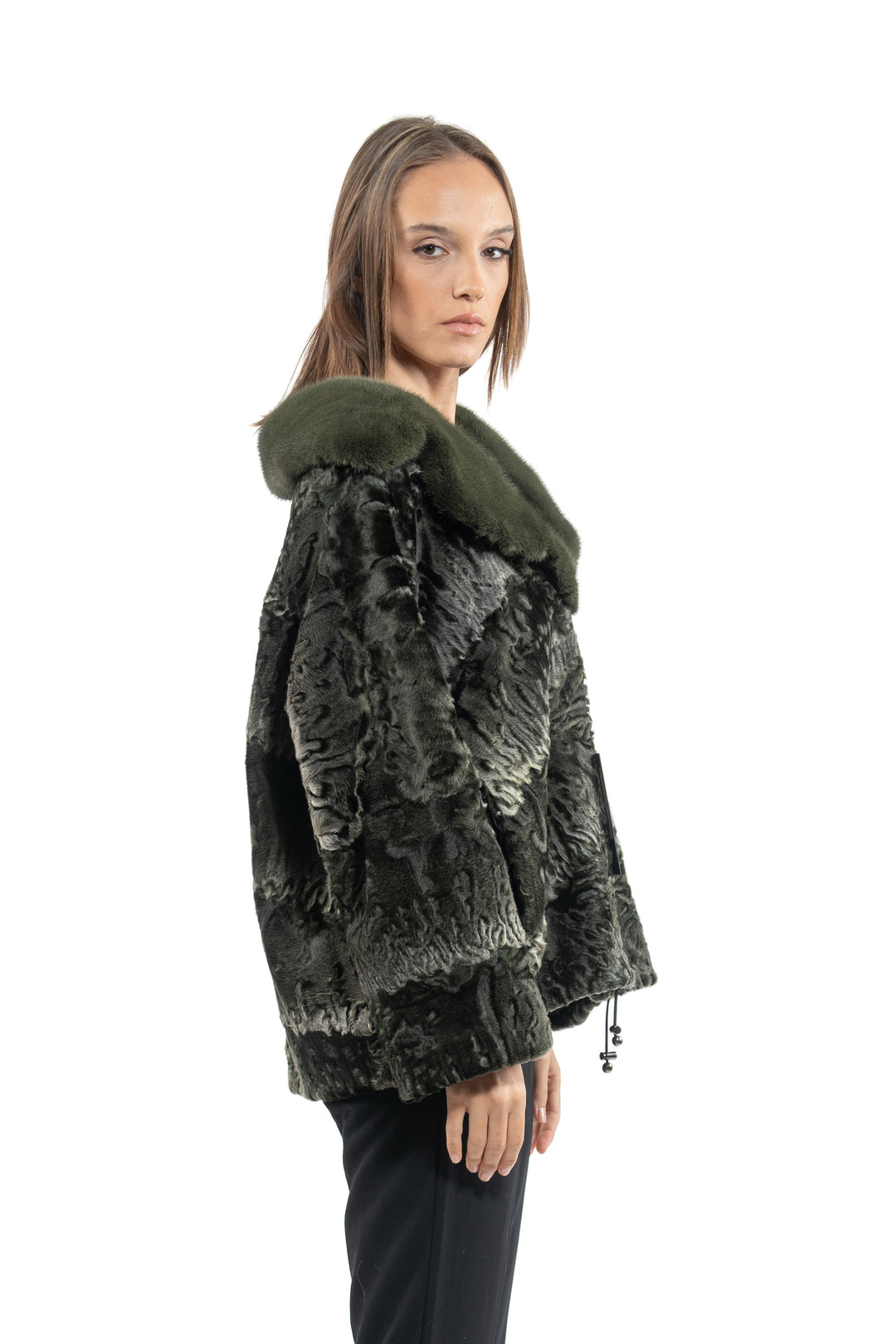 Model wearing a Dark Olive Swakara fur coat by manzari