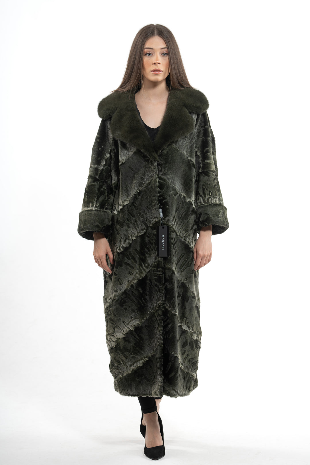 Model wearing a Dark Olive Swakara fur coat by manzari