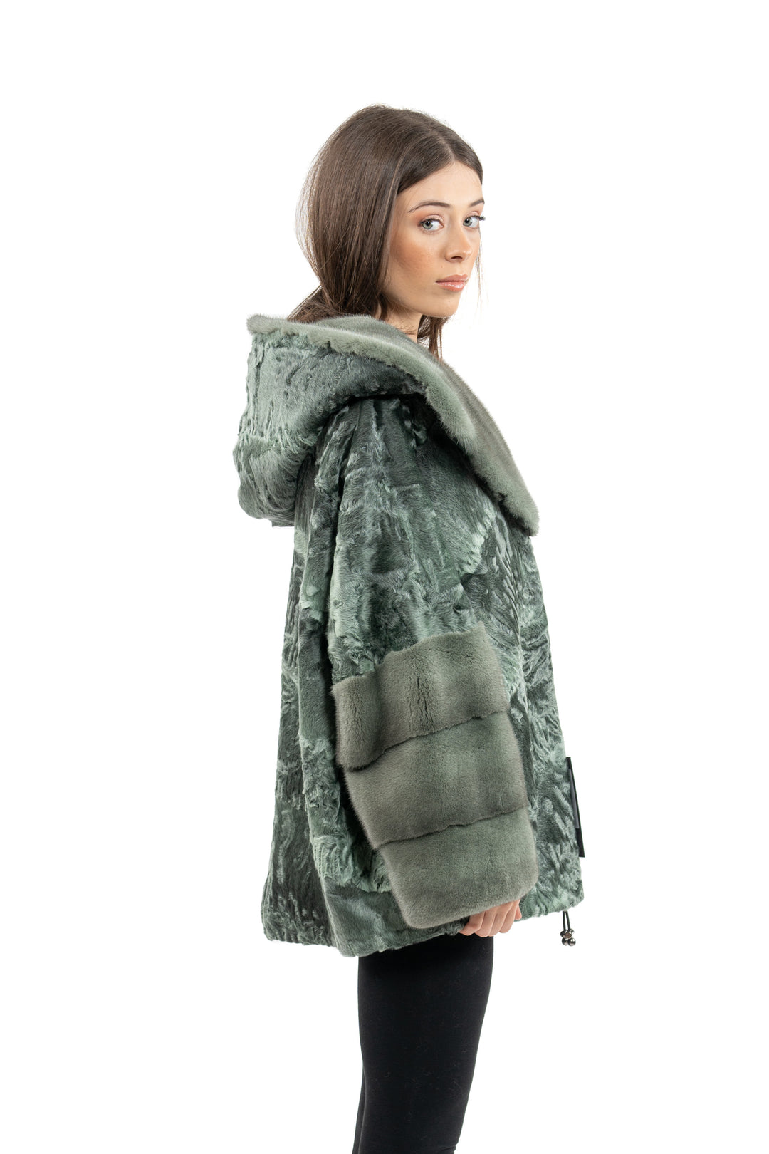 Model wearing a Green Metal Swakara fur coat by manzari