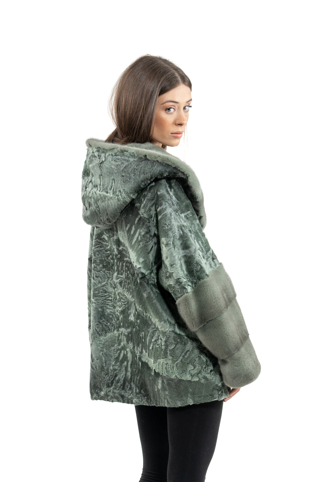 Model wearing a Green Metal Swakara fur coat by manzari