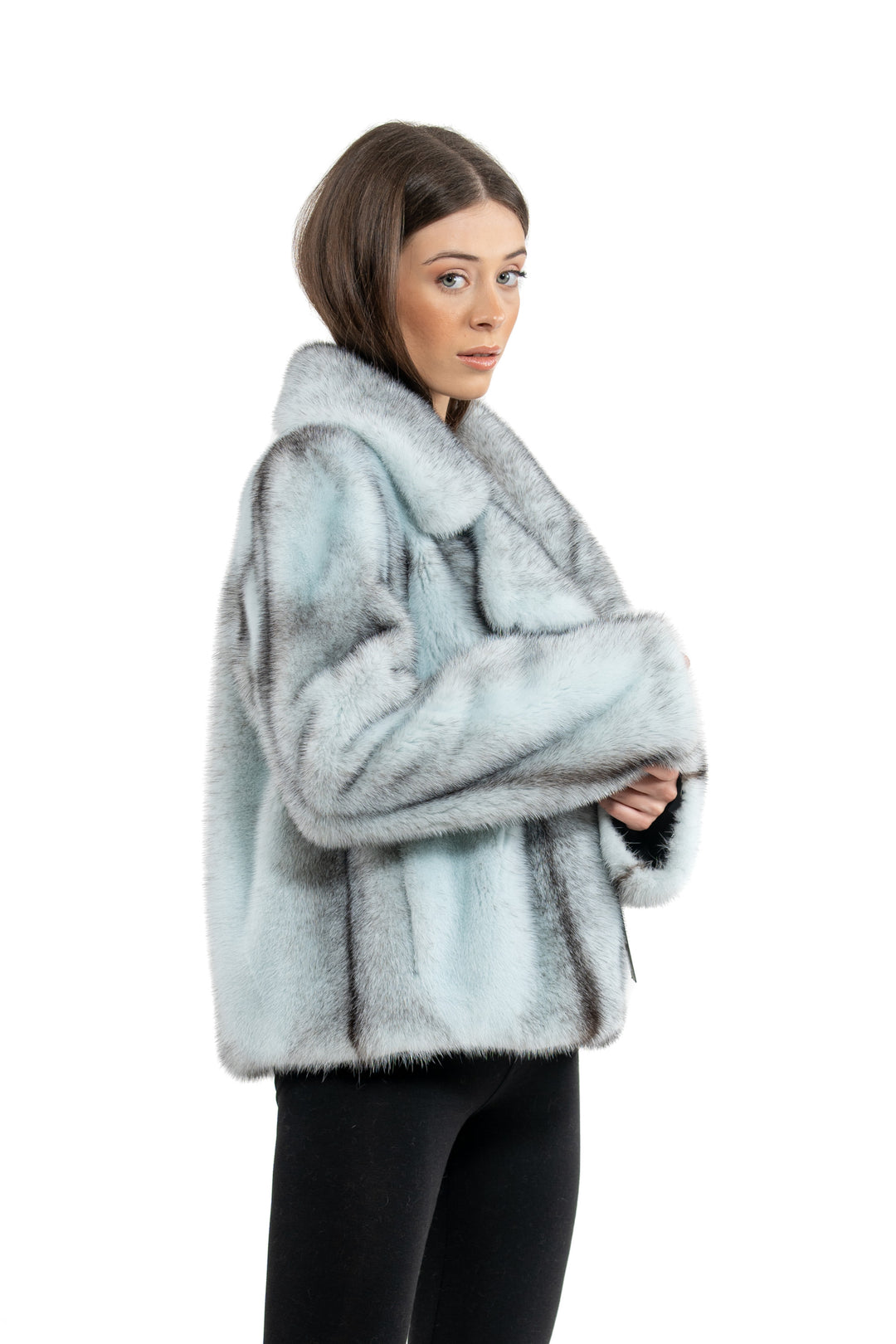 Model wearing a Turquoise Mink fur coat