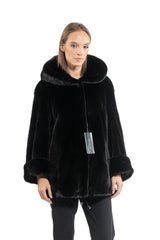 Short Blackglama mink jacket with a hood, featuring a relaxed fit, long sleeves with cuffs, and a concealed front closure.