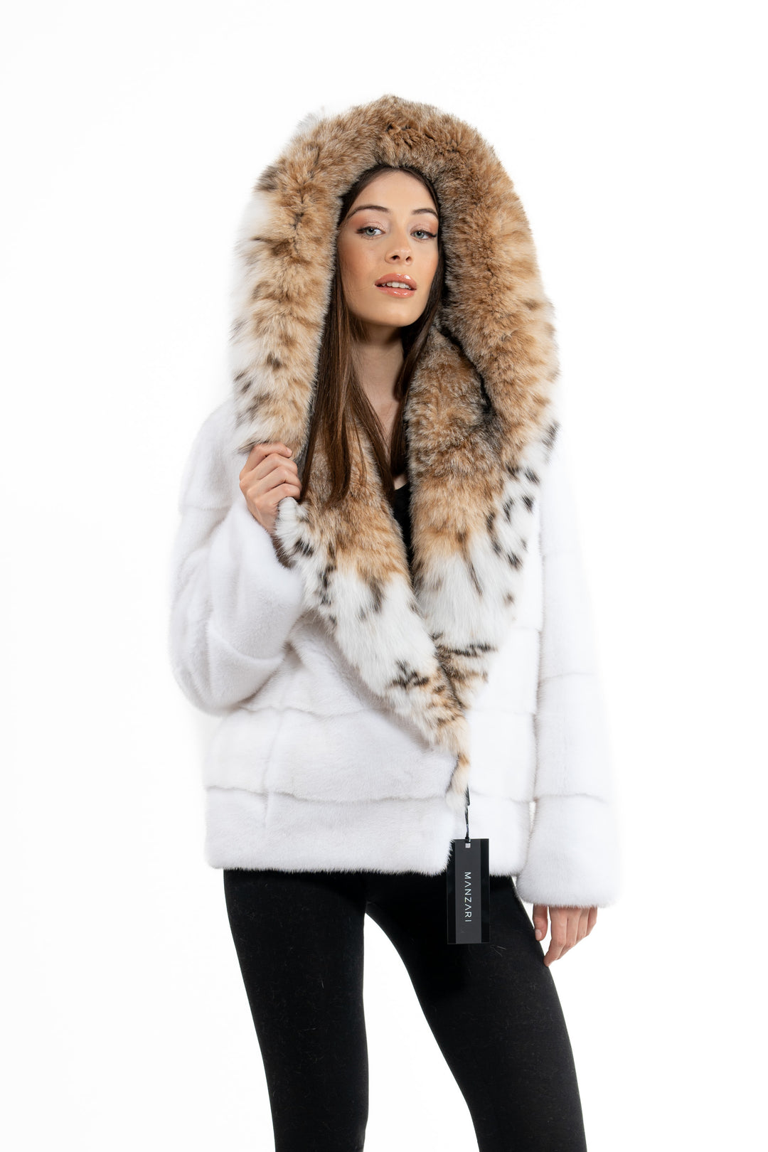 Model wearing a White Mink fur coat