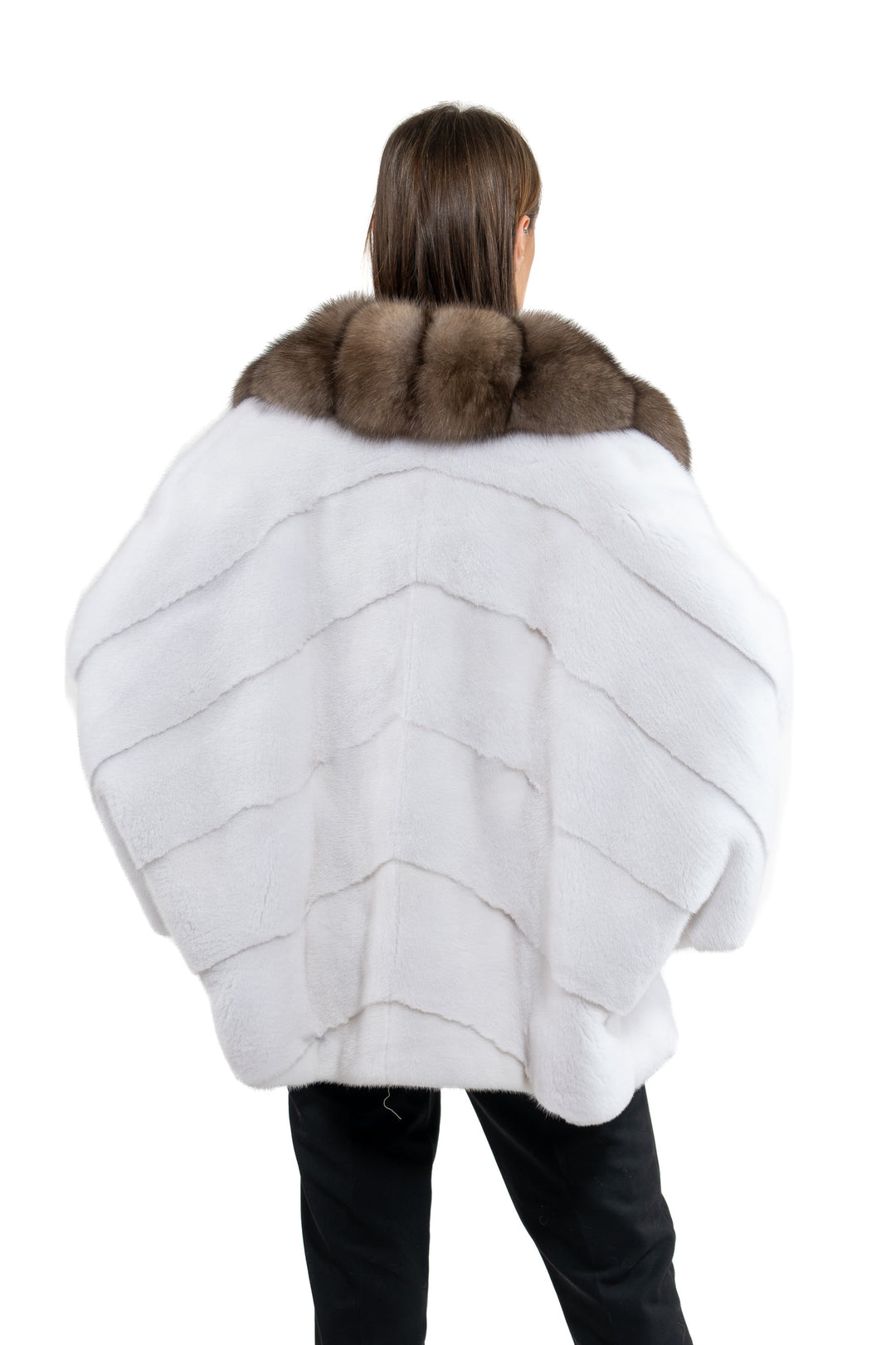 Model wearing a White Mink fur coat