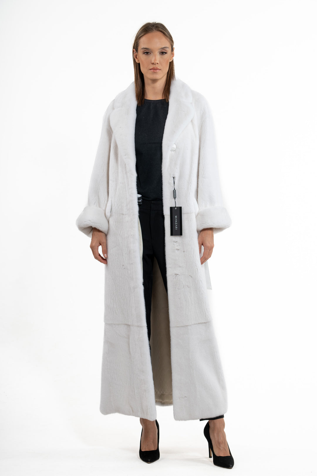 Model wearing a White Mink fur coat