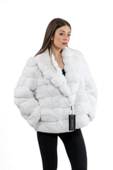 Snow white chinchilla jacket with horizontal panel construction and a notched lapel collar, shown from a front three-quarter view.