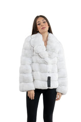 Snow white chinchilla jacket featuring horizontal paneling, a wide folded collar, and long sleeves, shown against a plain white background.