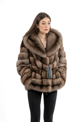 Lavender Russian sable short jacket featuring a plush hood, horizontal panels, and a V chevron pattern on the torso, shown against a white background.