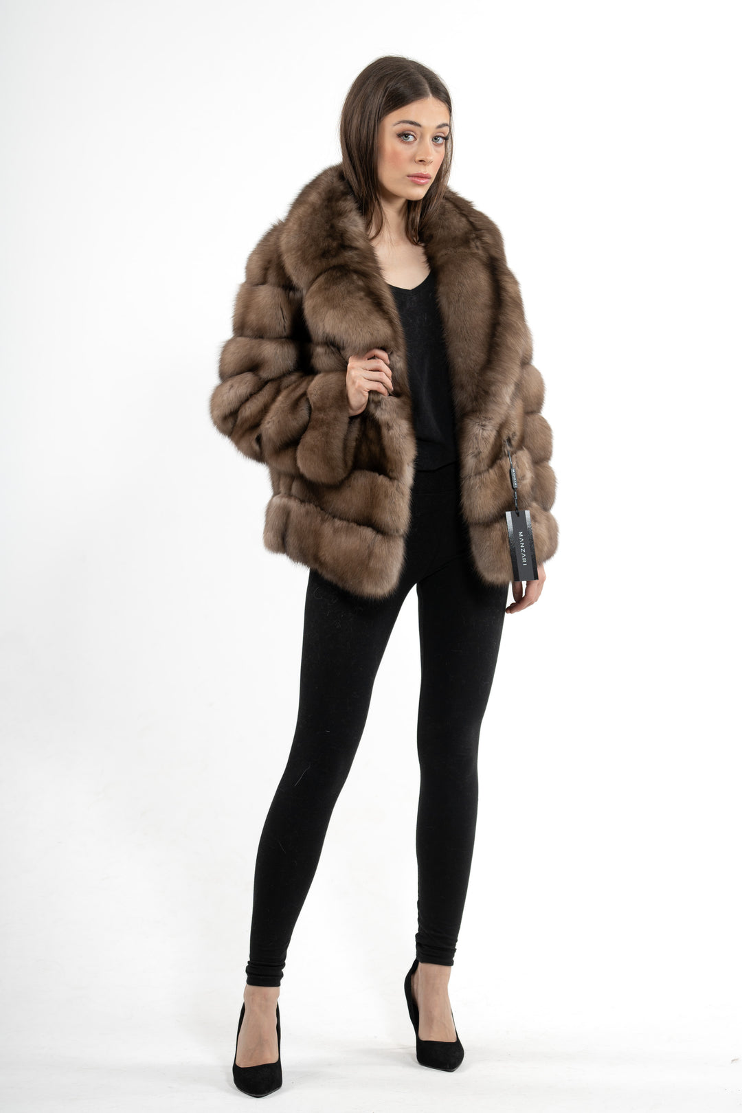 Model wearing a Platinum Russian sable fur coat by manzari