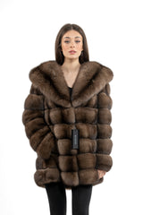 Gun metal Russian sable jacket with a large hood, featuring horizontal fur panel construction and a front Manzari brand tag.