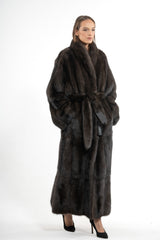 A Russian sable coat in deep brown, featuring vertical fur pelts, a wide shawl collar, full sleeves, and a matching tie belt at the waist.