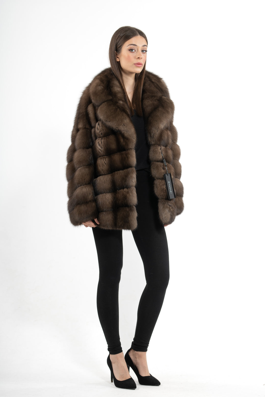Model wearing a Platinum Russian sable fur coat by manzari