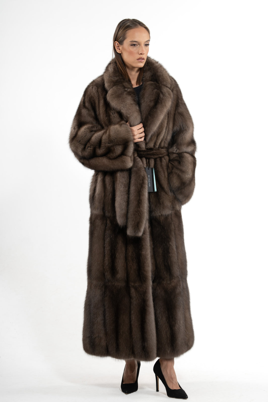 Model wearing a Platinum Russian sable fur coat by manzari