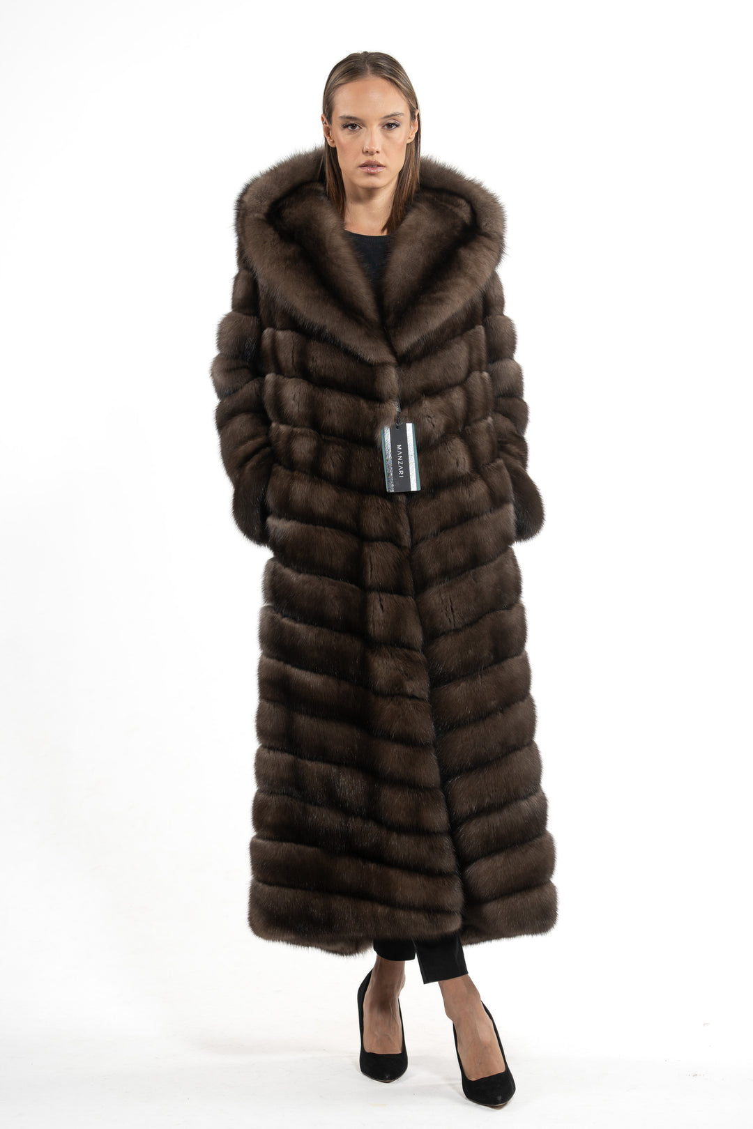 Model wearing a Platinum Russian sable fur coat by manzari