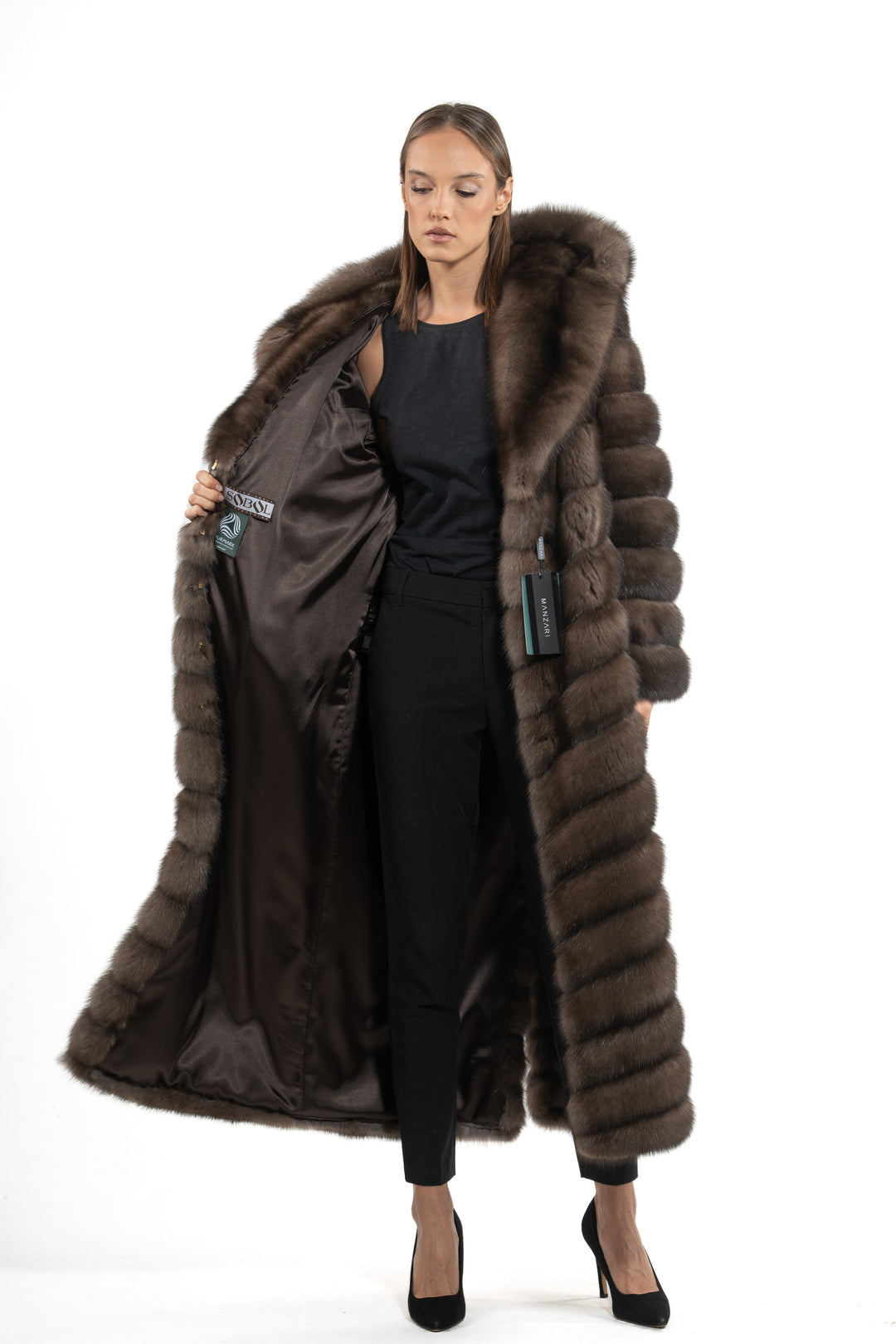 Luxurious Platinum Russian sable fur coat on display