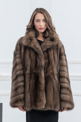 Russian sable short jacket with vertical fur panels on the body and sleeves, featuring a wide notched collar.